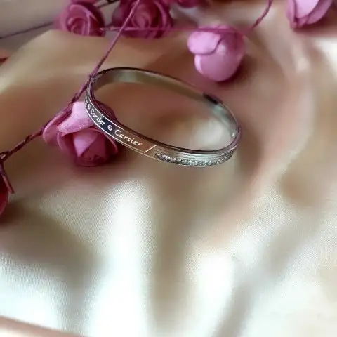 Gümüş Marka Yazılı Kelepçe 